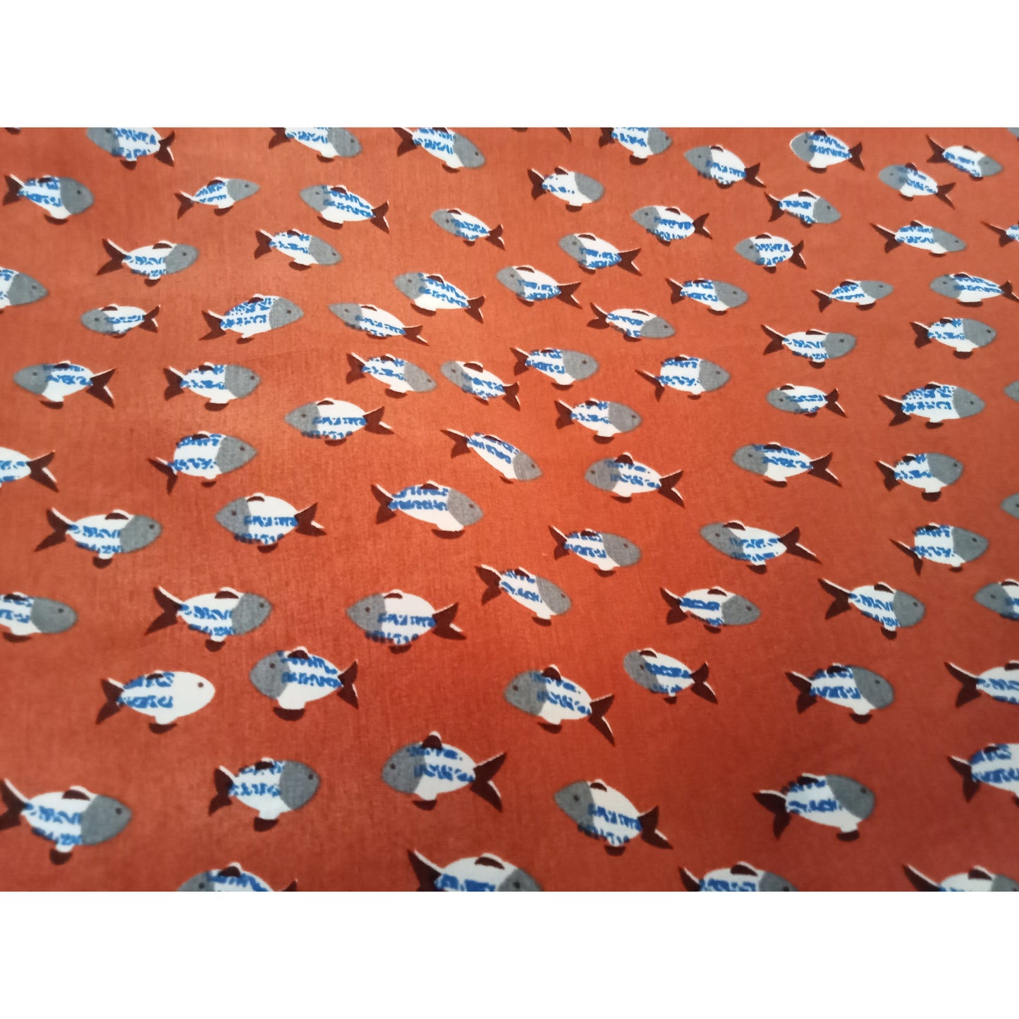 Fish printed woven fabric - sold by 1/2mtr