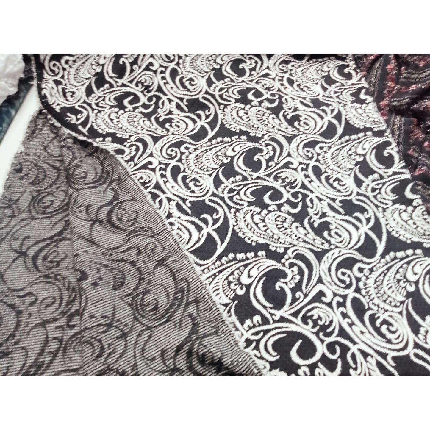 Jacquard design fabric - black/ivory sold by 1/2mtr