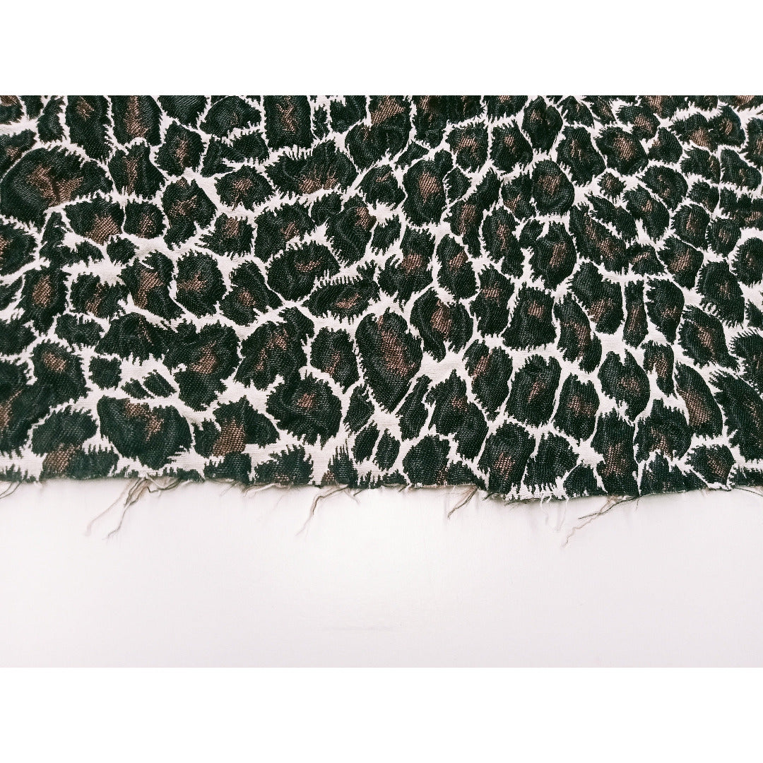 Leopard printed woven fabric - sold by 1/2mtr