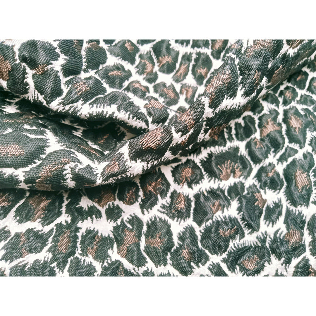 Leopard printed woven fabric - sold by 1/2mtr