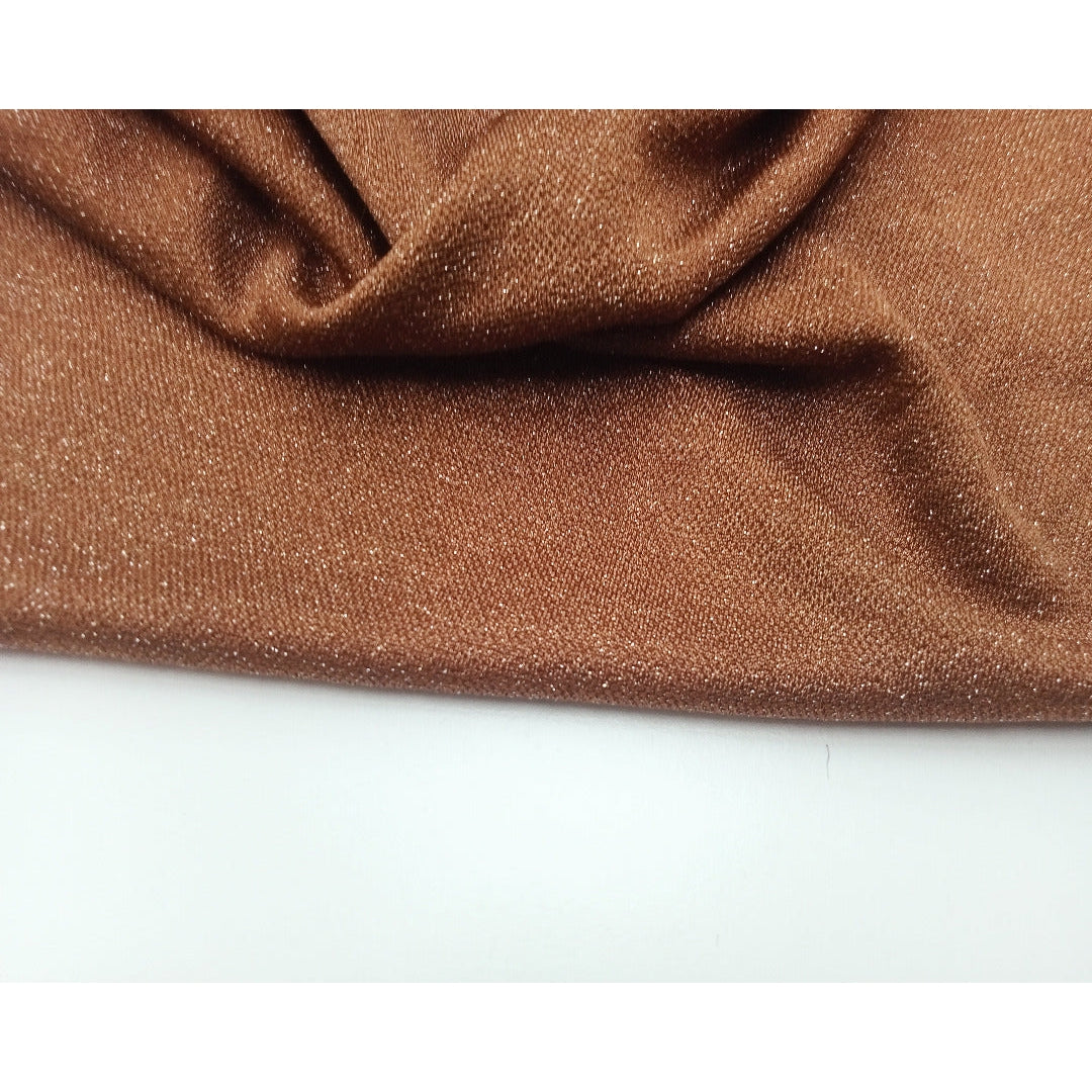 Peggy - shimmer metallic jersey fabric sold by 1/2mtr