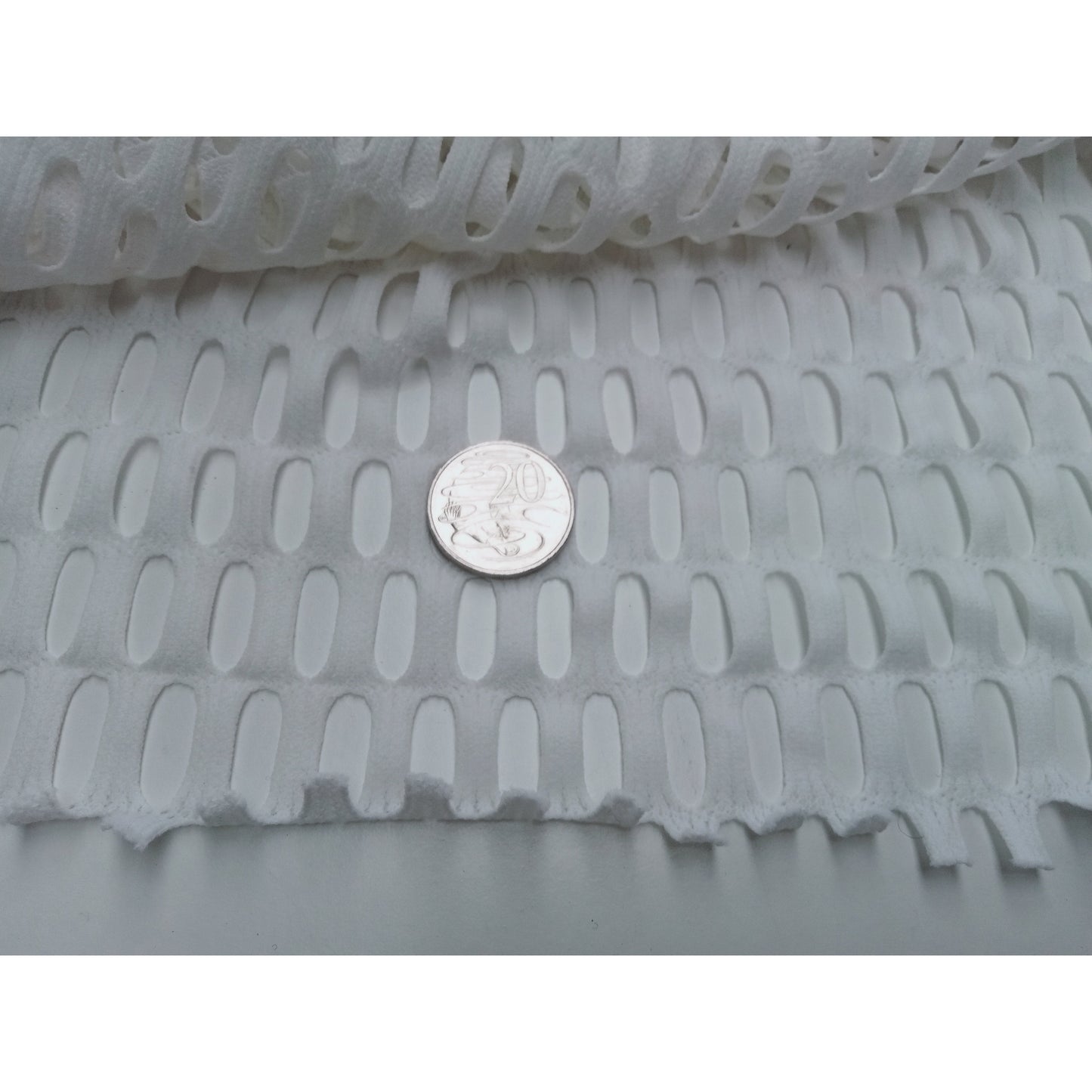 Cutout stretch knit -white sold by 1/2mtr