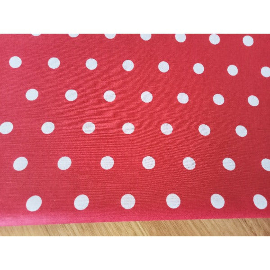 Polka dot printed cotton/linen fabric sold by 1/2mtr