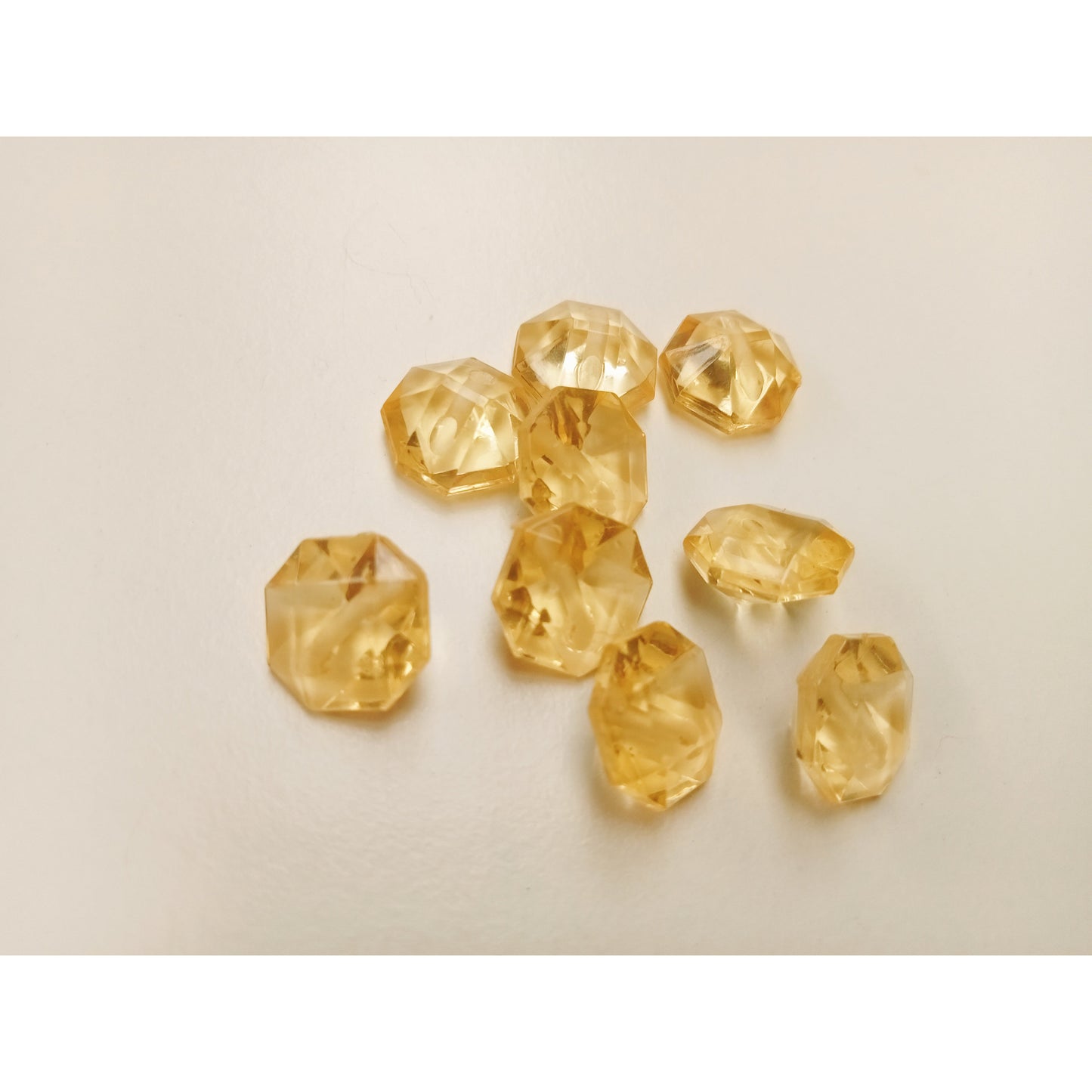 Gold coloured glass buttons. - 9