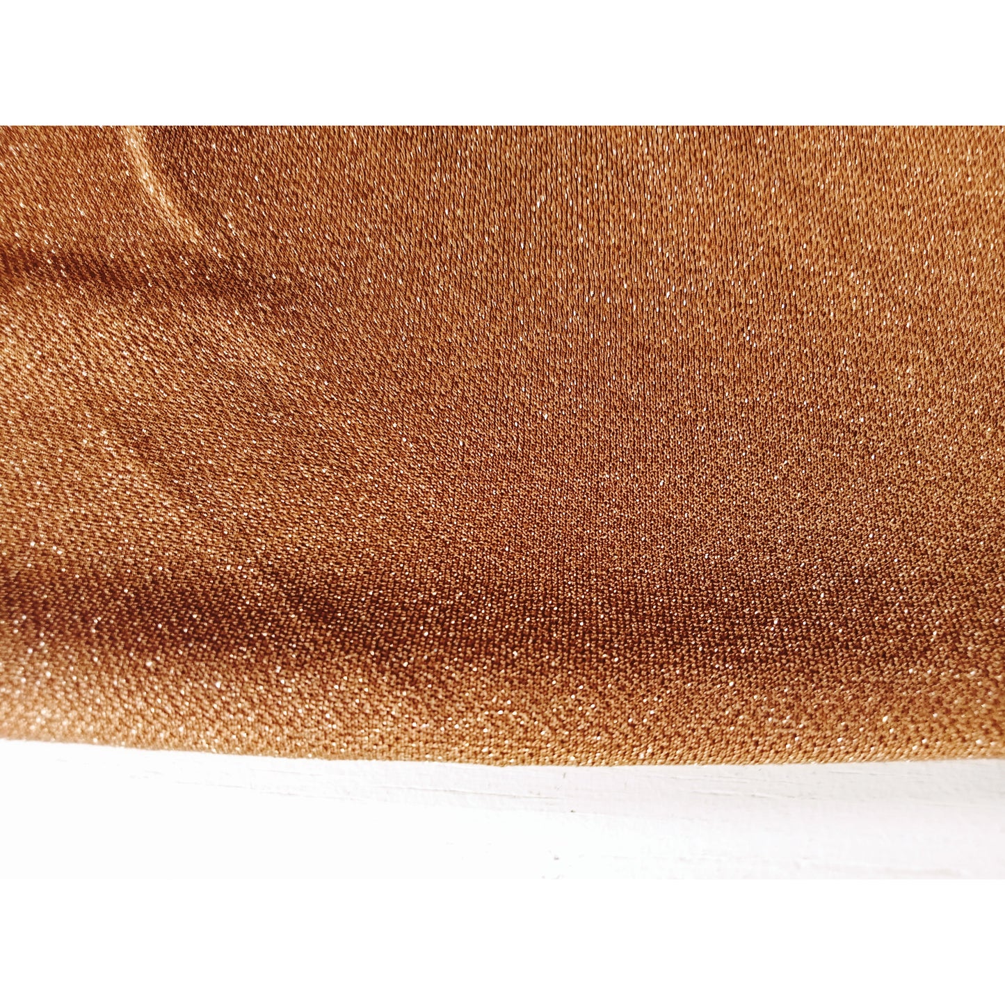 Peggy - shimmer metallic jersey fabric sold by 1/2mtr