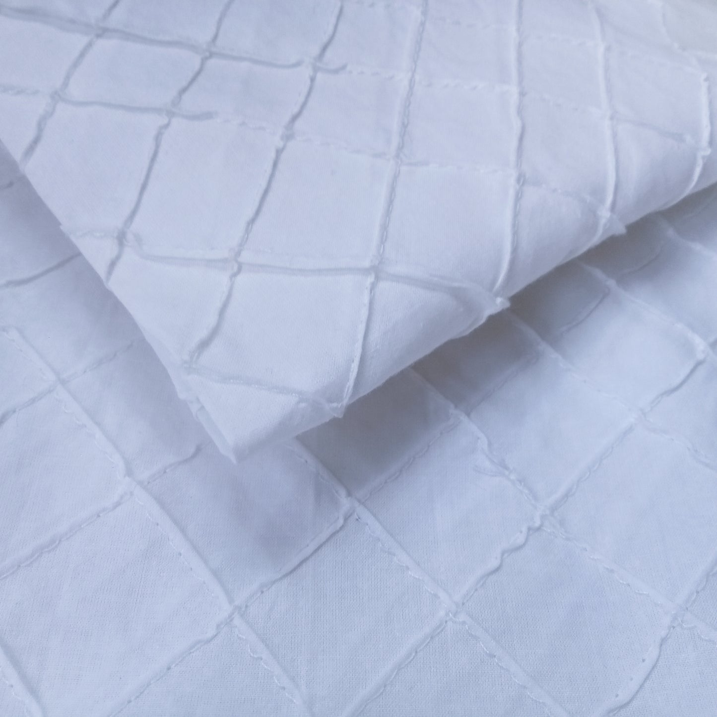 Priscilla - diagonal pintucks - sold by 1/2mtr