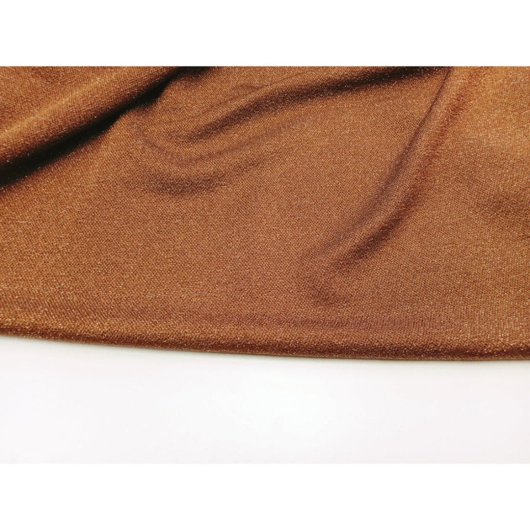 Peggy - shimmer metallic jersey fabric sold by 1/2mtr
