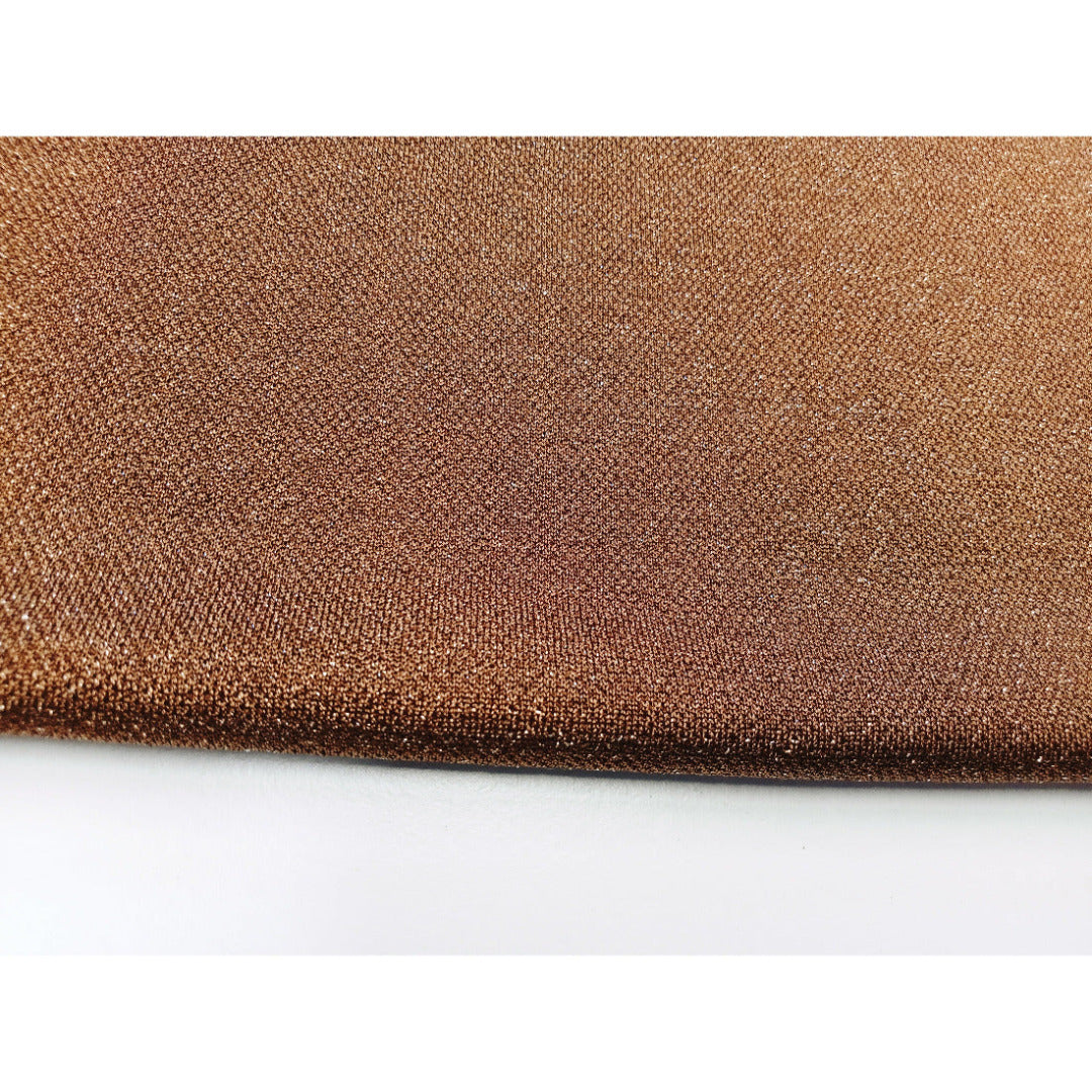 Peggy - shimmer metallic jersey fabric sold by 1/2mtr