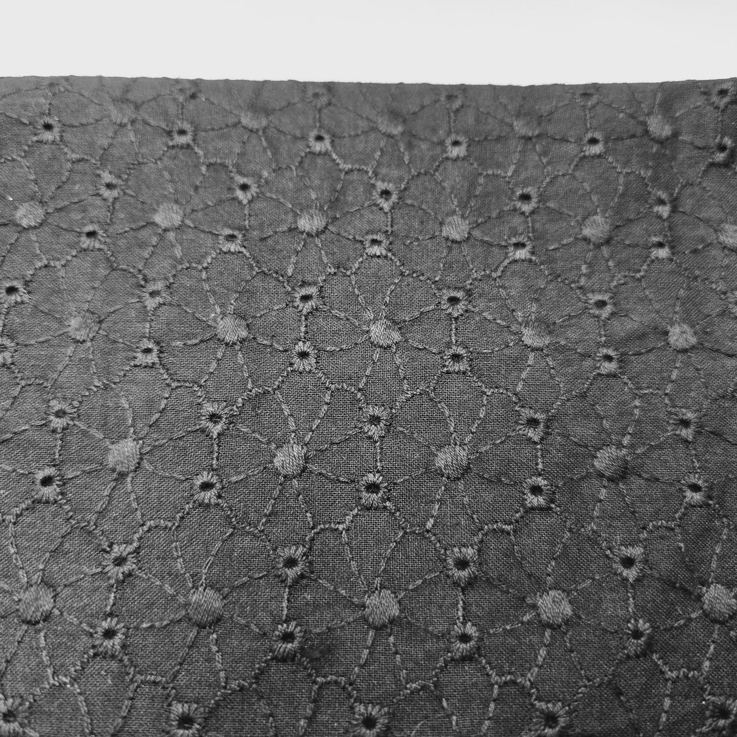 Black broderie anglaise woven fabric - 1/2mtr