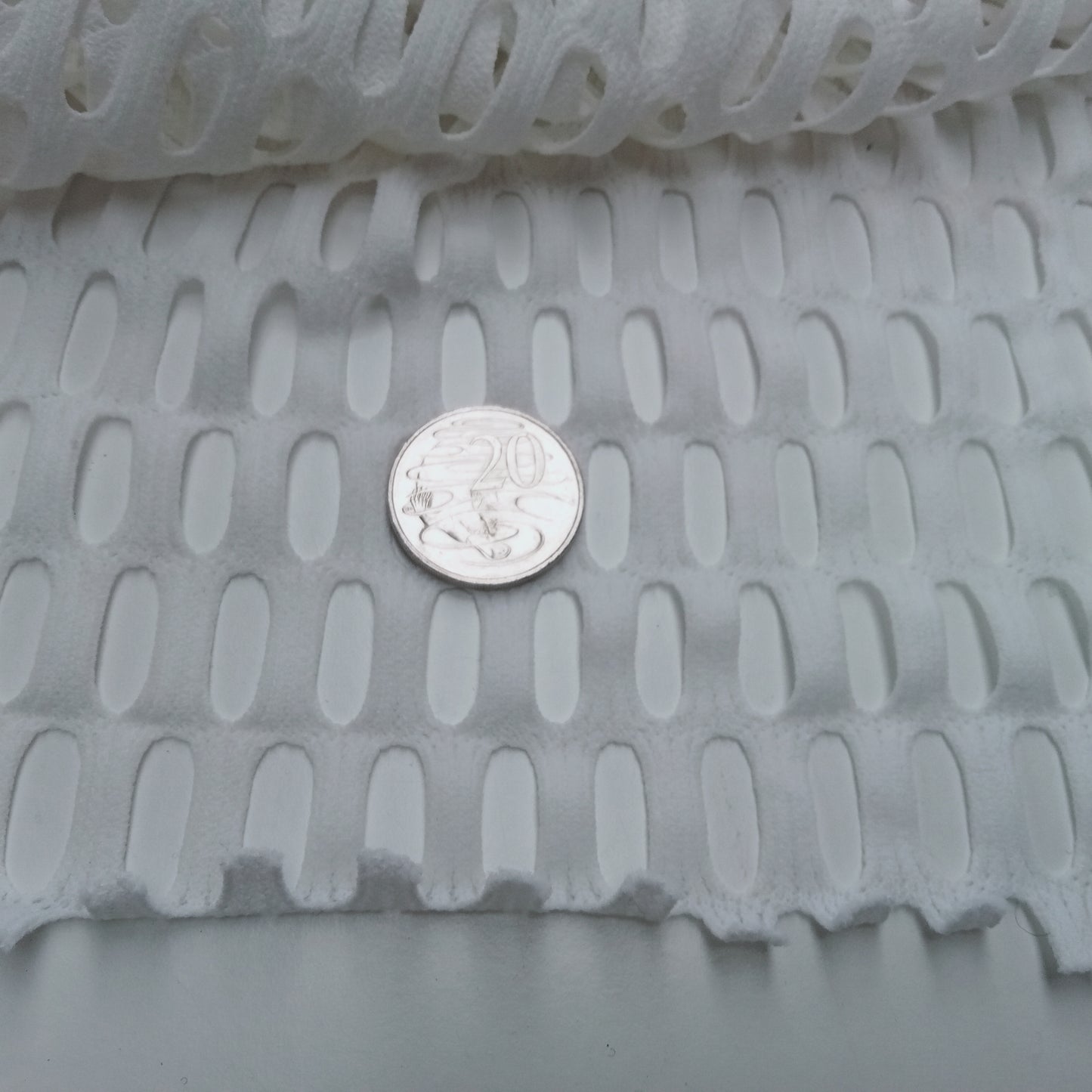 Mesh large eyelet design - white - sold by 1/2mtr