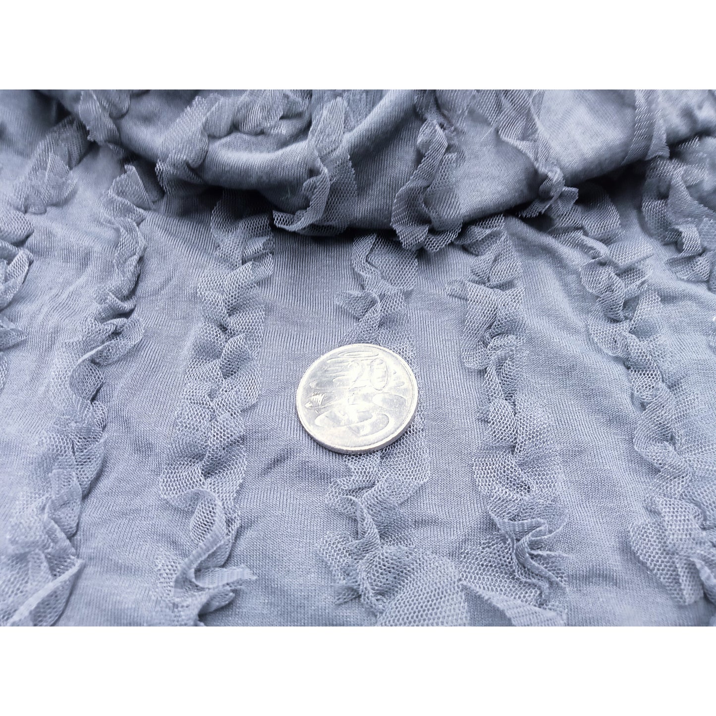 Romie - embellished jersey fabric -sold by 1/2mtr