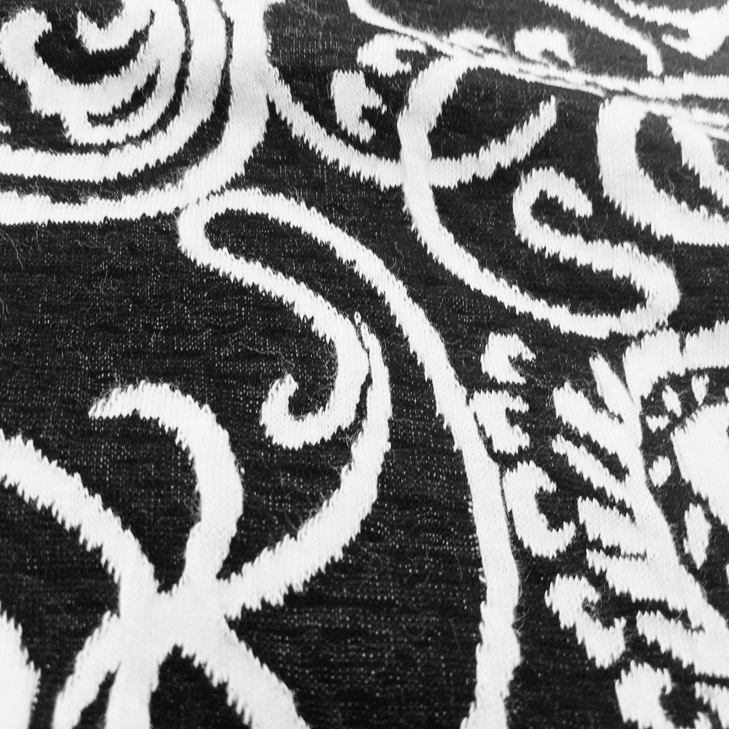 Jacquard design fabric - black/ivory sold by 1/2mtr