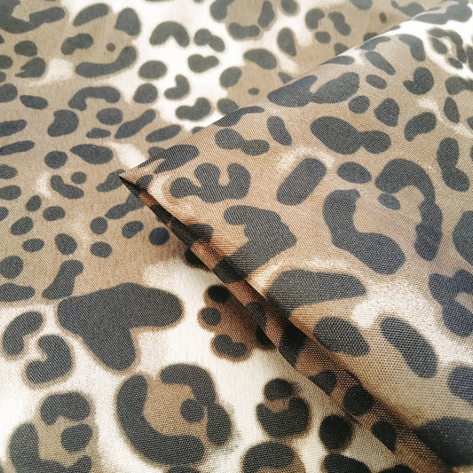 Leopard print woven fabric - sold by 1/2mtr